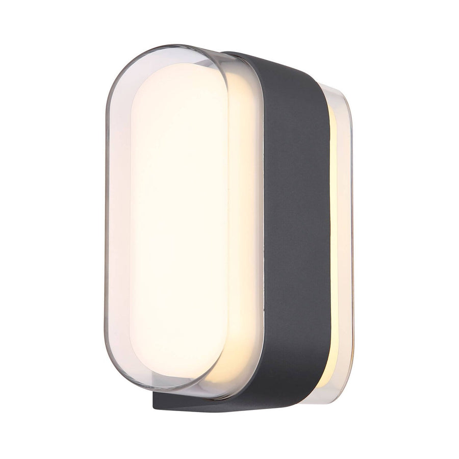 Vue de face inclinée du luminaire mural anthracite avec diffuseur blanc allumé.