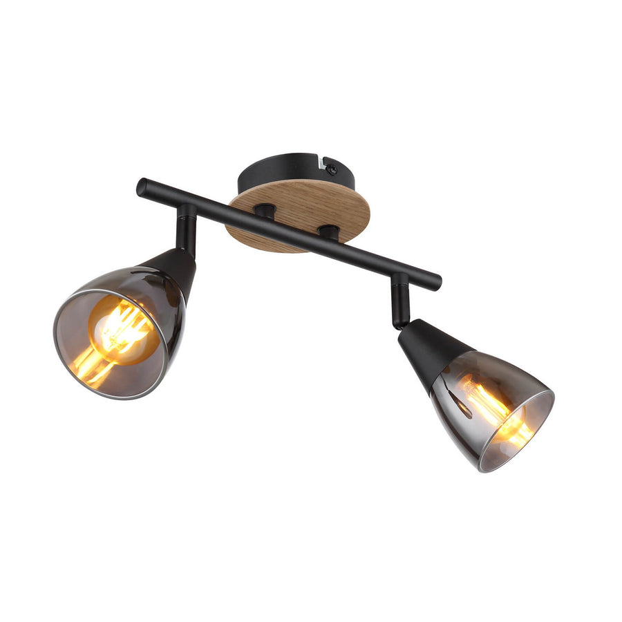 Spot double orientable en métal noir mat avec base en bois clair, vue de face.