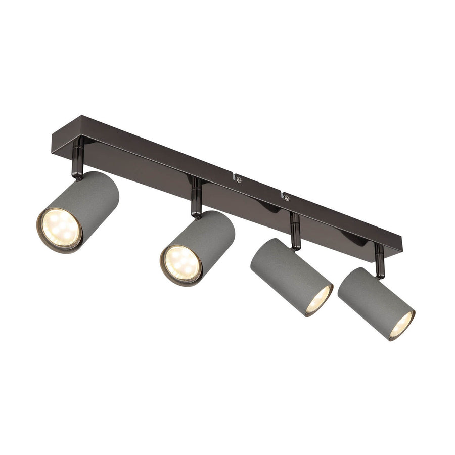 Vue de trois quarts du spot quatre projecteurs orientables sur rail noir et chromé