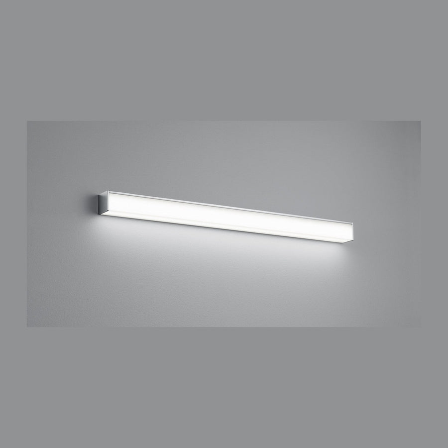 Vue frontale de l'applique allumée diffusant une lumière blanche uniforme