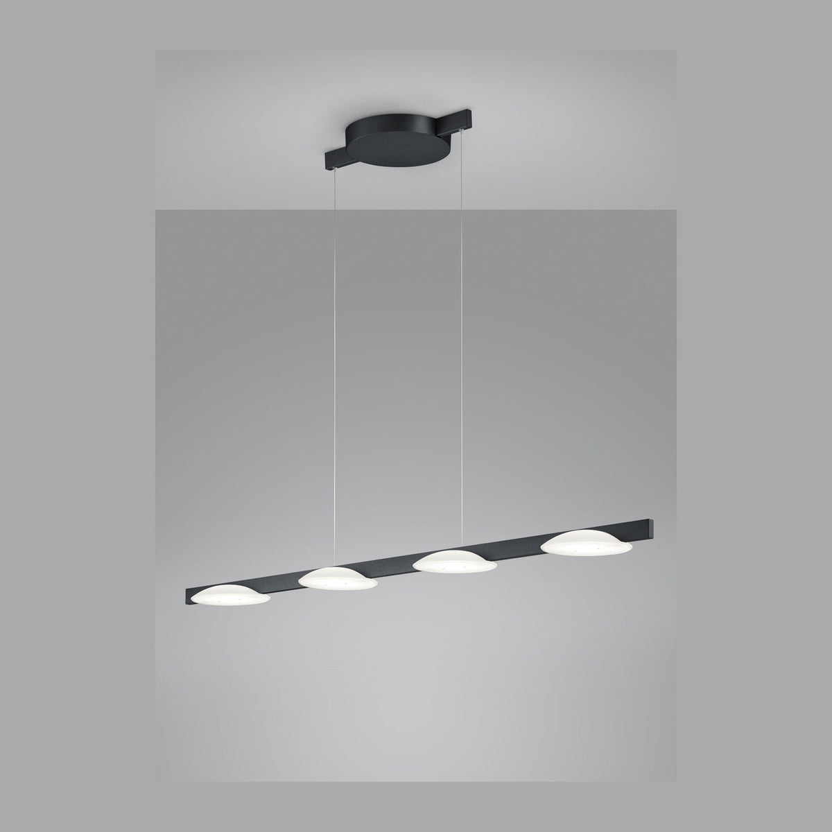Vue d'ensemble sur fond gris du bandeau noir et de ses quatre diffuseurs blancs