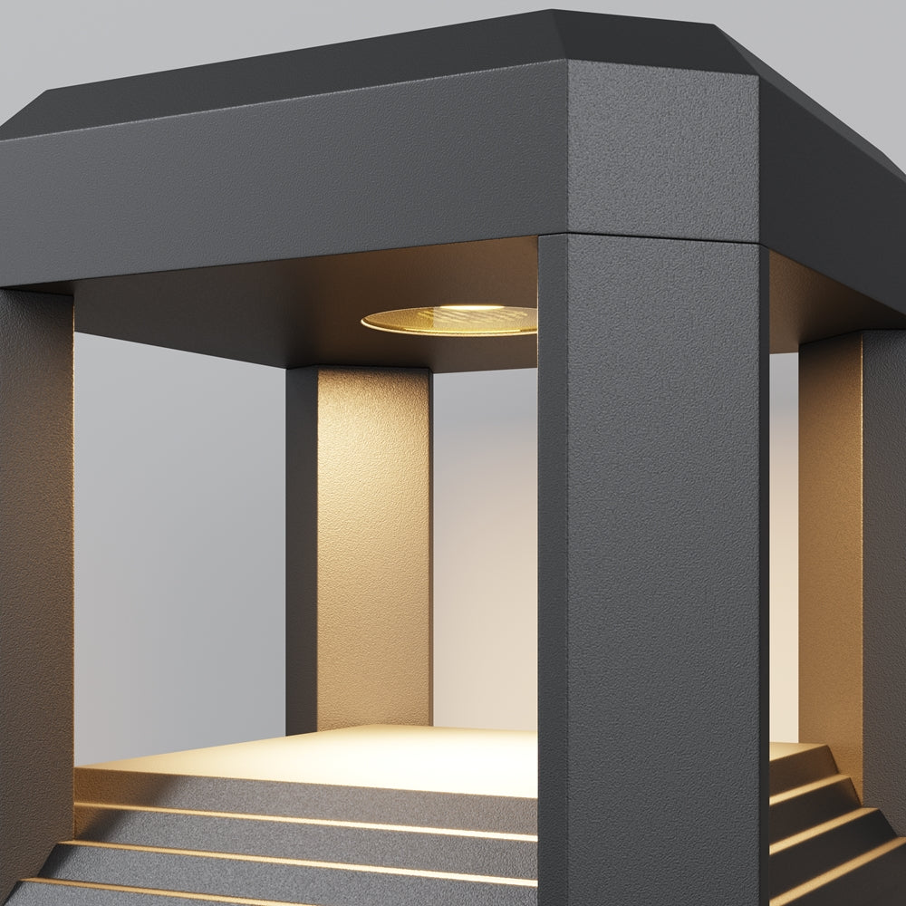 Gros plan sur la finition aluminium gris texturé et le réflecteur doré intérieur.