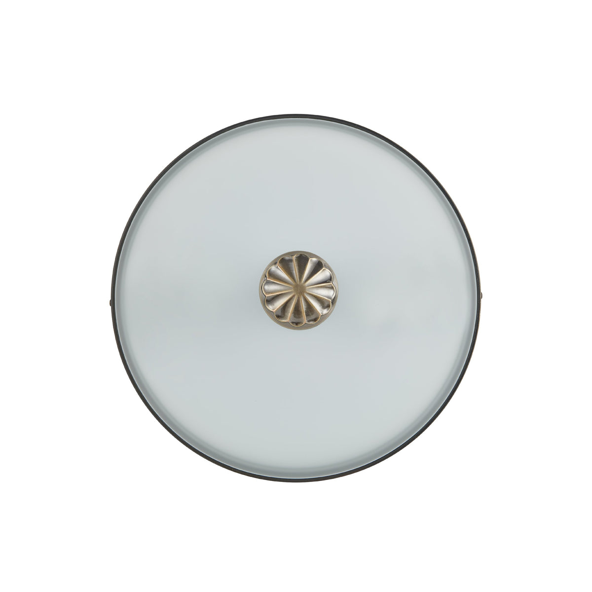 Vue par dessous montrant le verre circulaire et la finition centrale décorative.