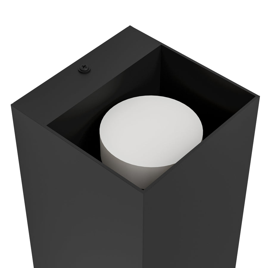 Vue de dessous montrant le diffuseur rond blanc logé dans le boîtier ouvert