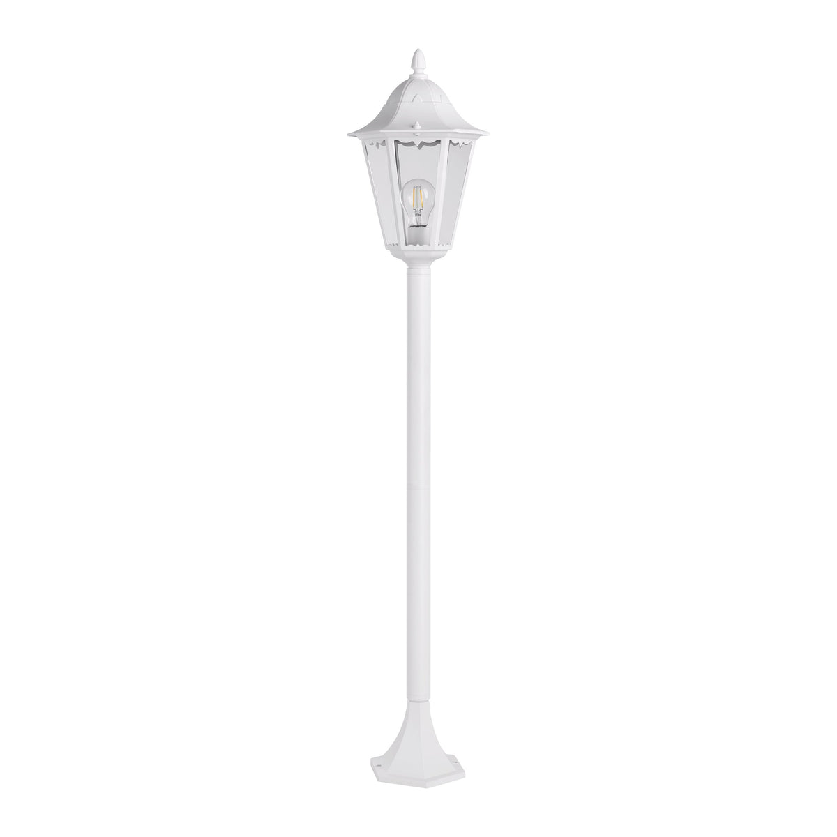 Vue de trois quarts du lampadaire blanc, ampoule allumée visible dans la lanterne vitrée.