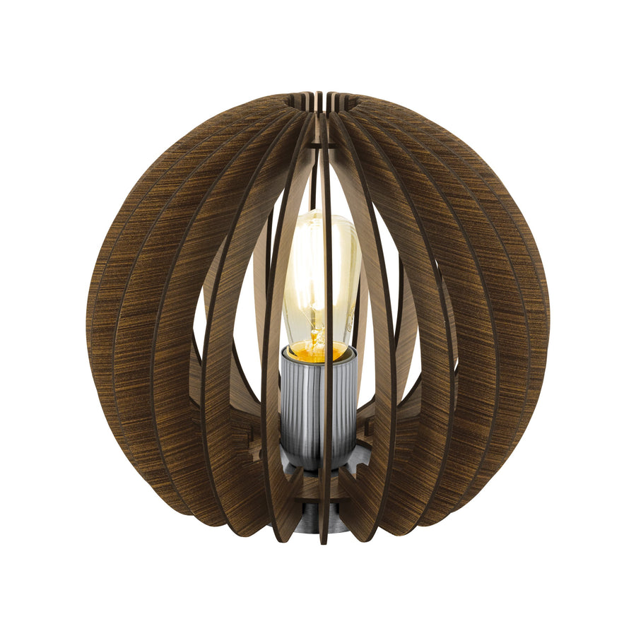 Même lampe allumée, lumière chaude traversant les lamelles de bois cintrées