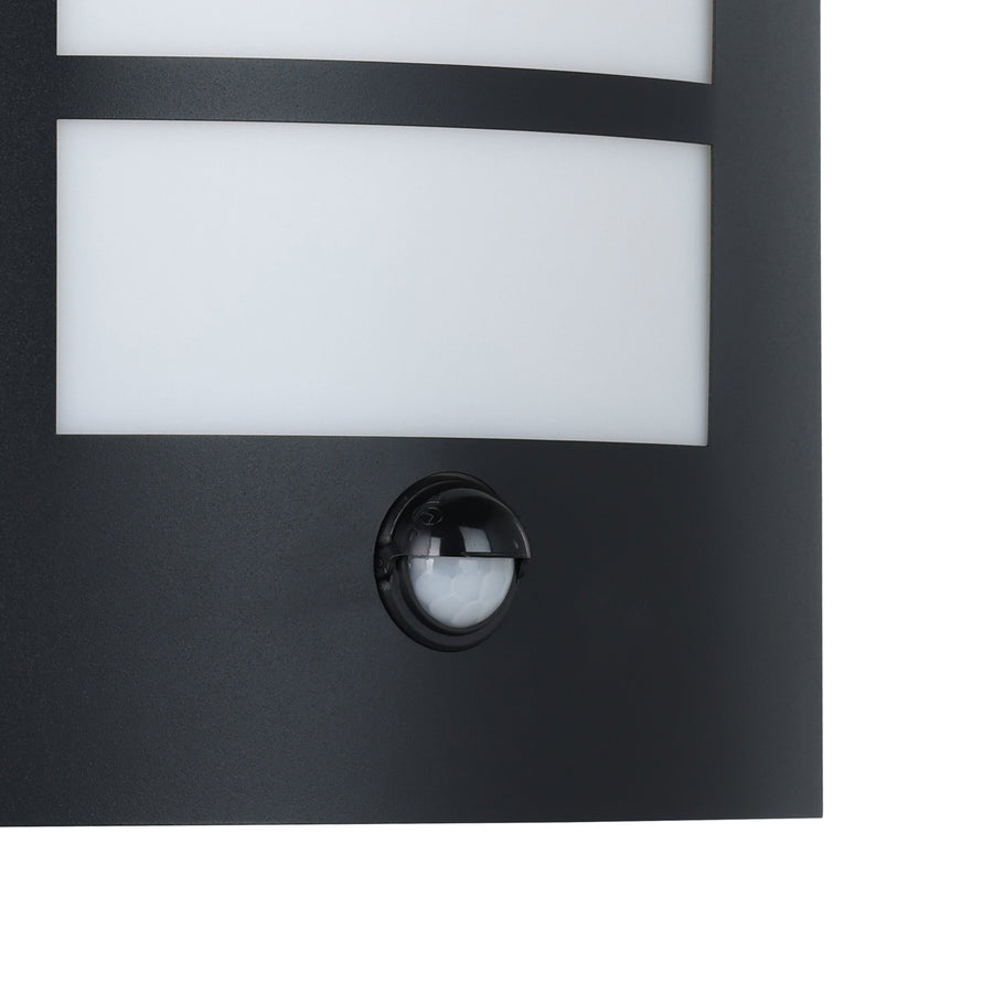 Détail du détecteur de mouvement et du diffuseur blanc inférieur.