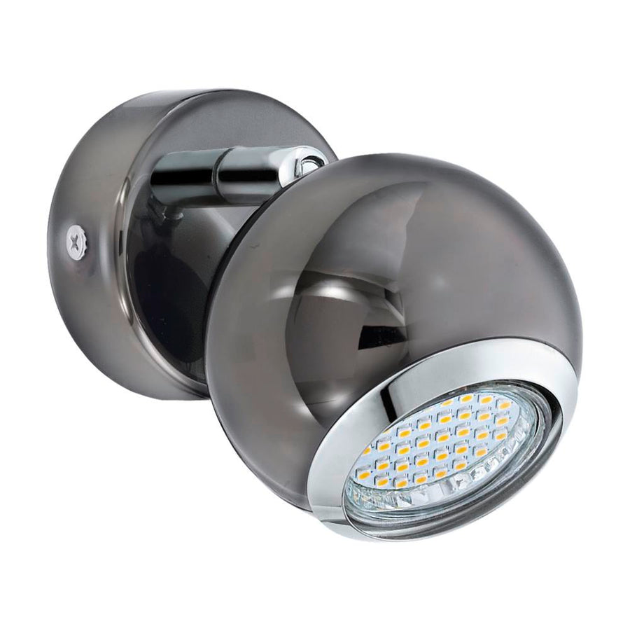 Vue de trois quarts du spot mural orientable noir et nickel, réflecteur LED allumé