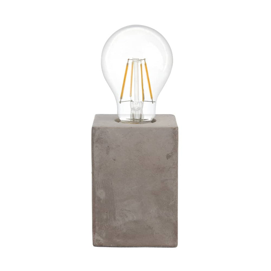 Lampe à poser en béton gris avec ampoule transparente à filament, vue de face