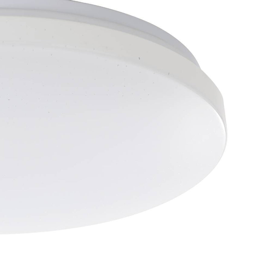 Détail du bord et de la finition du diffuseur blanc au rendu satiné