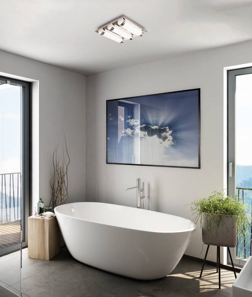 Mise en ambiance d'une salle de bain moderne avec baignoire îlot et plafonnier