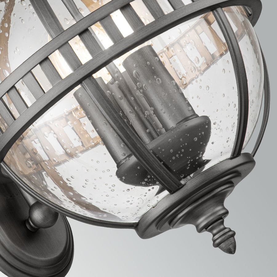 Détail intérieur du globe en verre granité et des trois douilles à ampoules