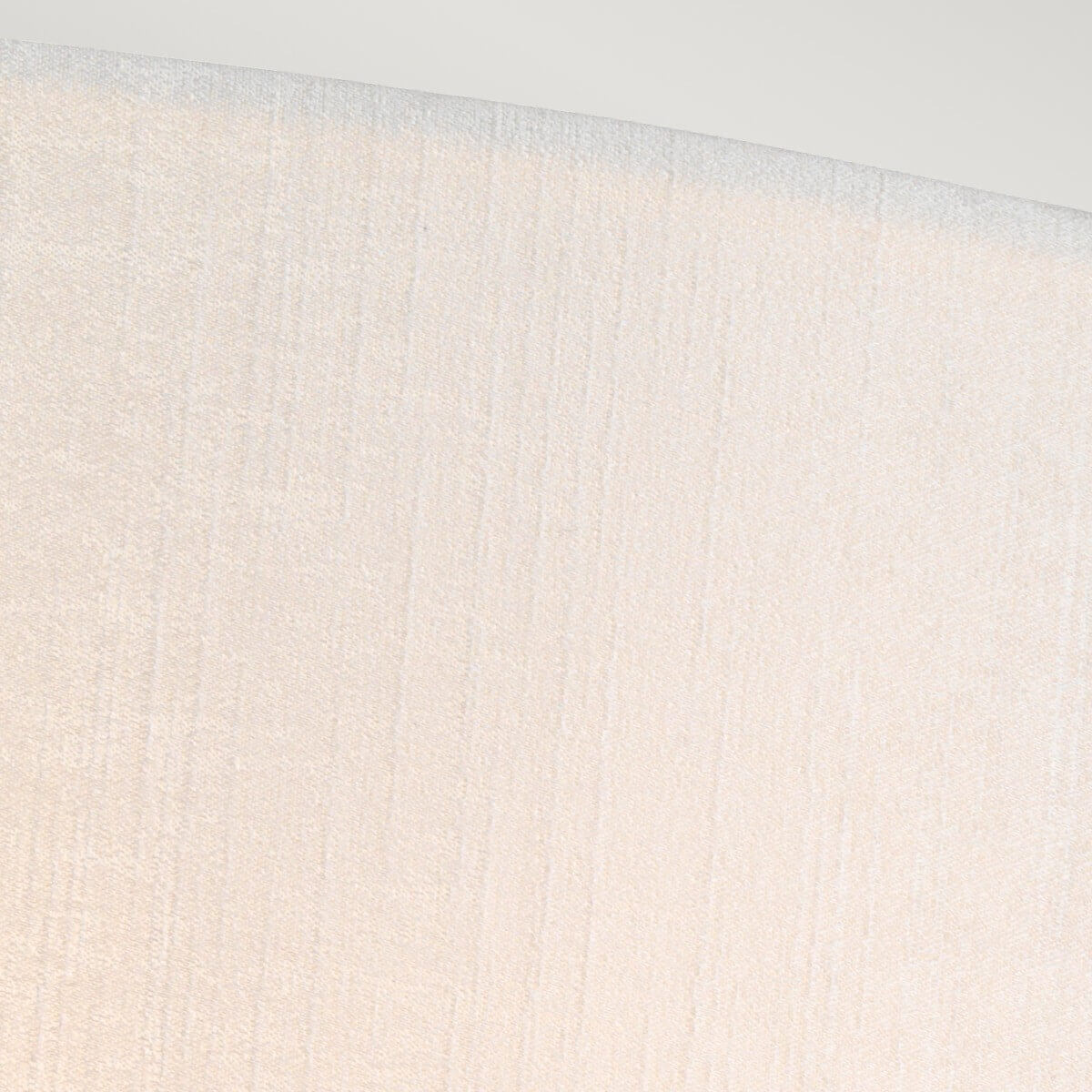 Détail rapproché du tissu crème texturé de l'abat-jour.