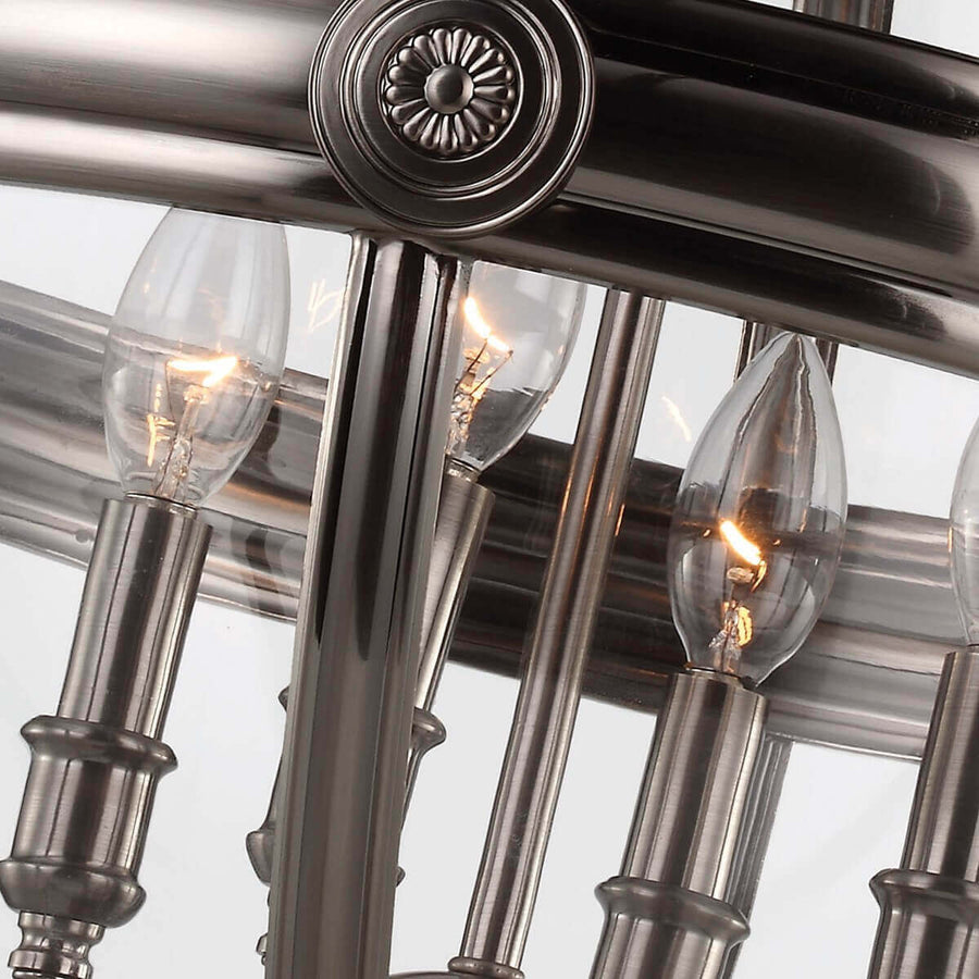 Bande métallique centrale ornée d'un médaillon rosace, ampoules visibles à l'intérieur
