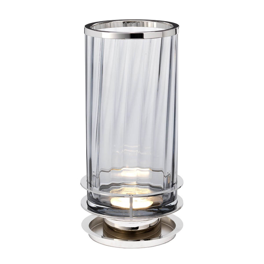 Lampe à poser de face, cylindre en verre fumé et socle en nickel poli, allumée