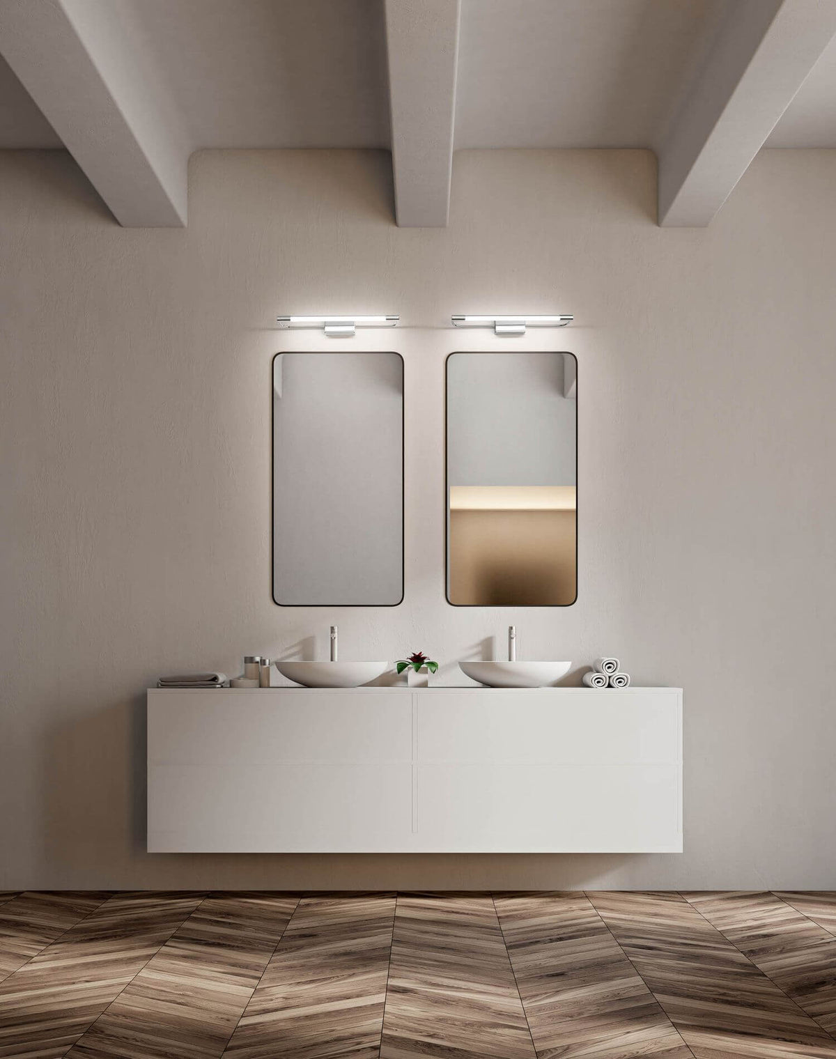 Mise en ambiance salle de bain, deux appliques chromées éclairant des miroirs au-dessus de vasques