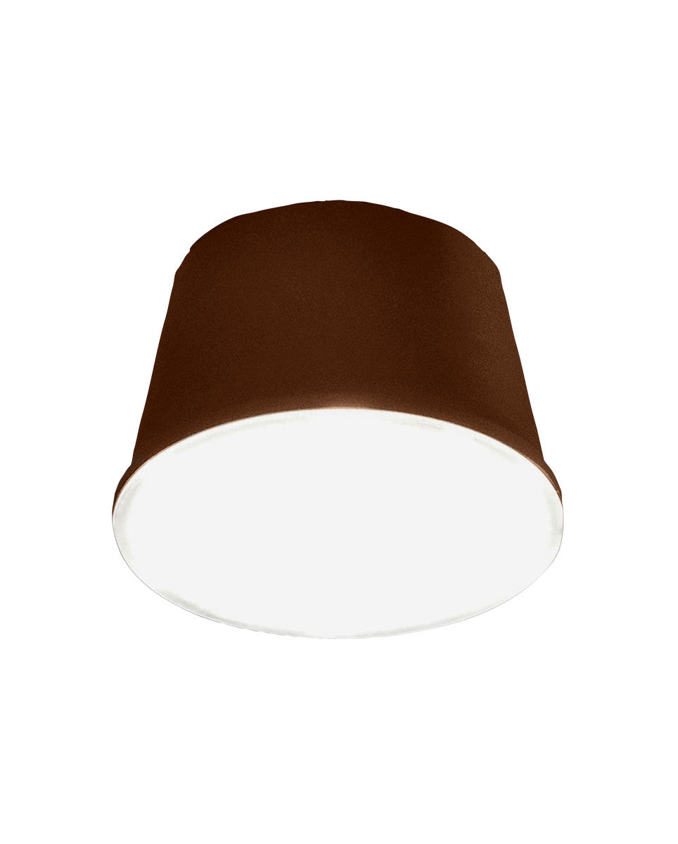 Projecteur extérieur présenté de face sur fond blanc, couleur rouille et diffuseur opale