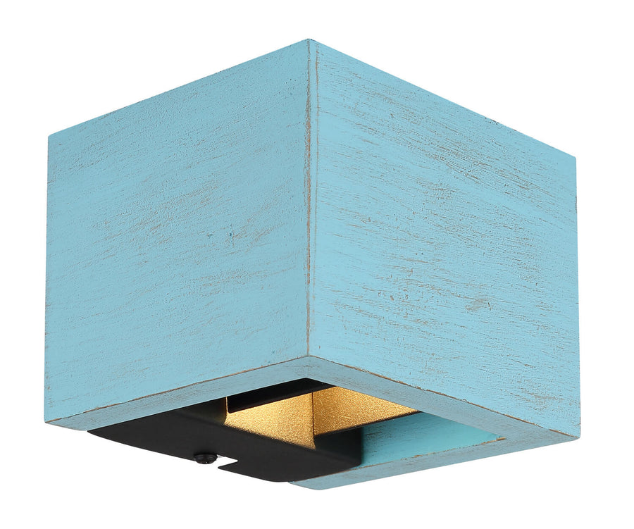 Détail rapproché de l'angle du caisson bleu et de l'ouverture éclairée dorée