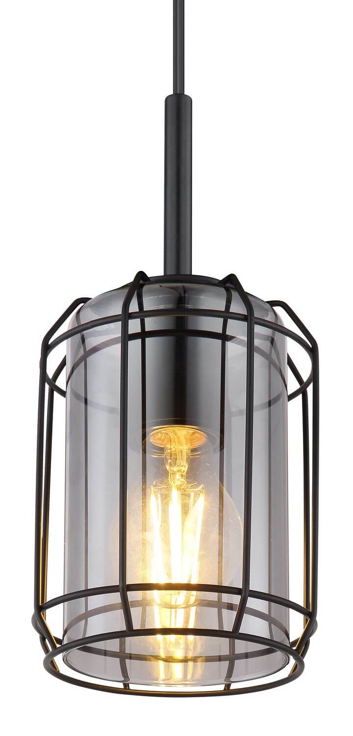 Gros plan sur la cage métallique, le verre et l'ampoule Edison allumée.