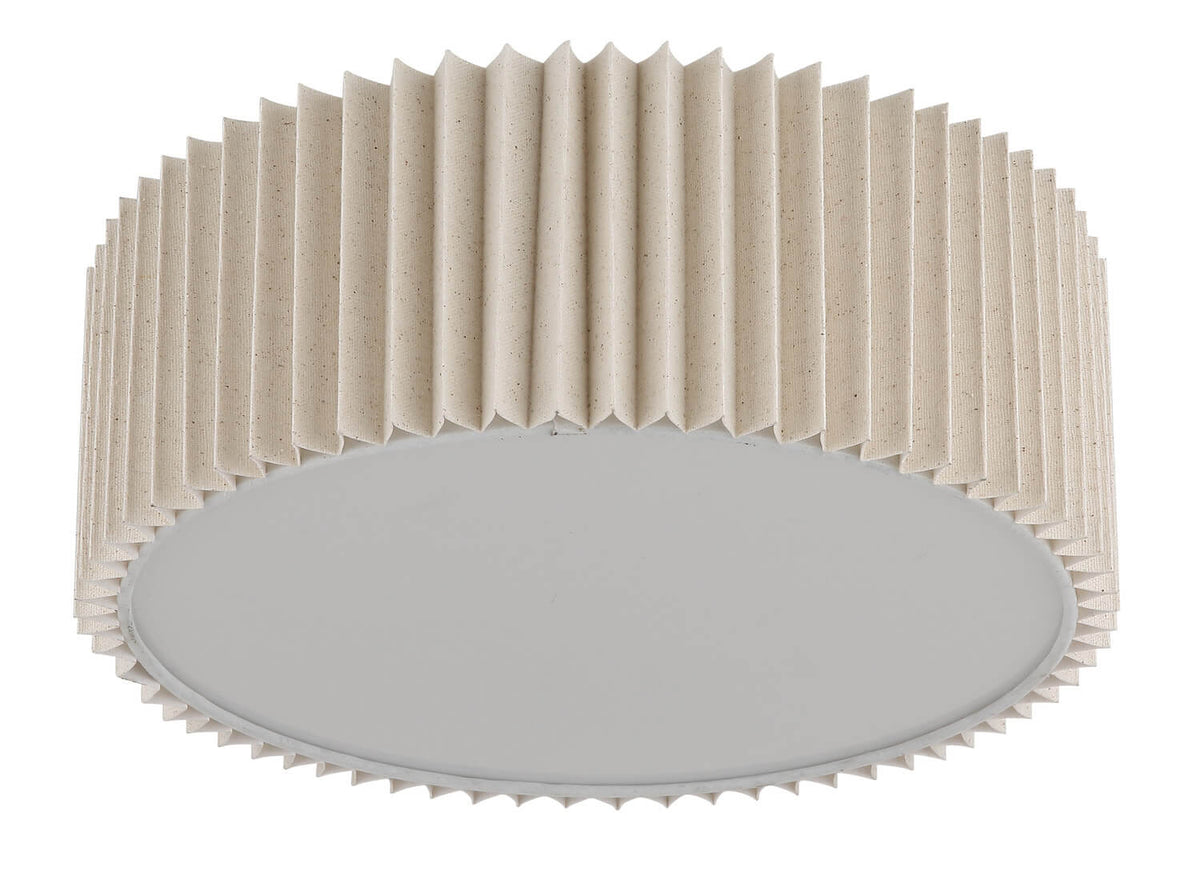 Détail de la finition plissée beige tachetée et du contour festonné