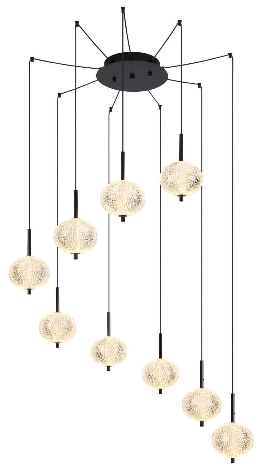 Suspension allumée, lumière chaude traversant les globes de verre texturé