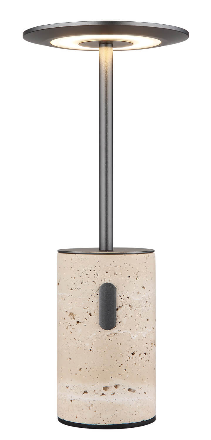 Lampe allumée sur fond blanc, détail de l'éclairage LED sous le disque.