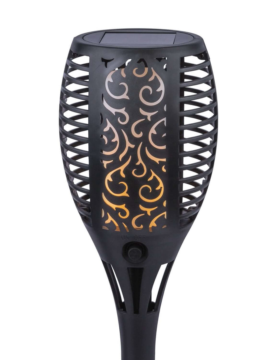 Gros plan sur la tête ajourée, motif arabesque lumineux, panneau solaire et bouton.