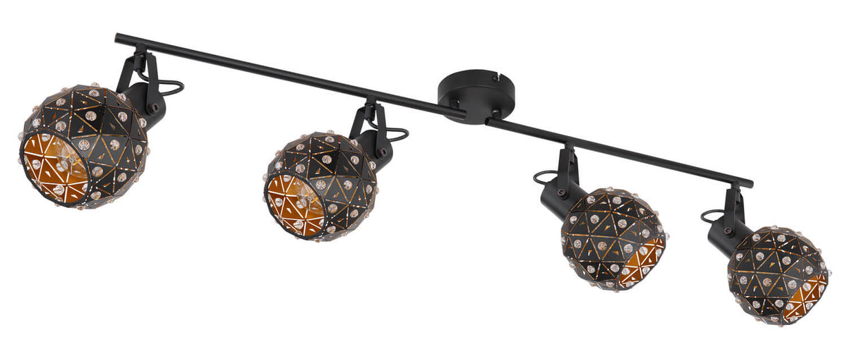 Vue rapprochée du luminaire noir, mettant en valeur les reflets dorés des diffuseurs perforés