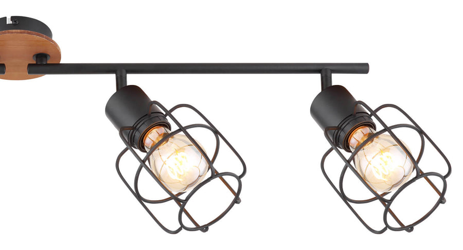 Gros plan sur deux spots cages noirs et leur support central en bois