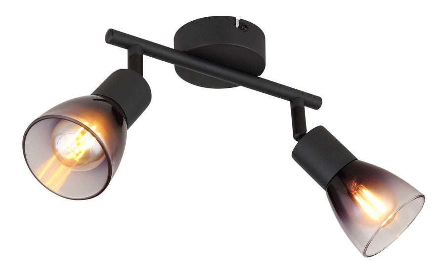 Vue rapprochée des deux têtes coniques en verre fumé fixées sur une barre noire