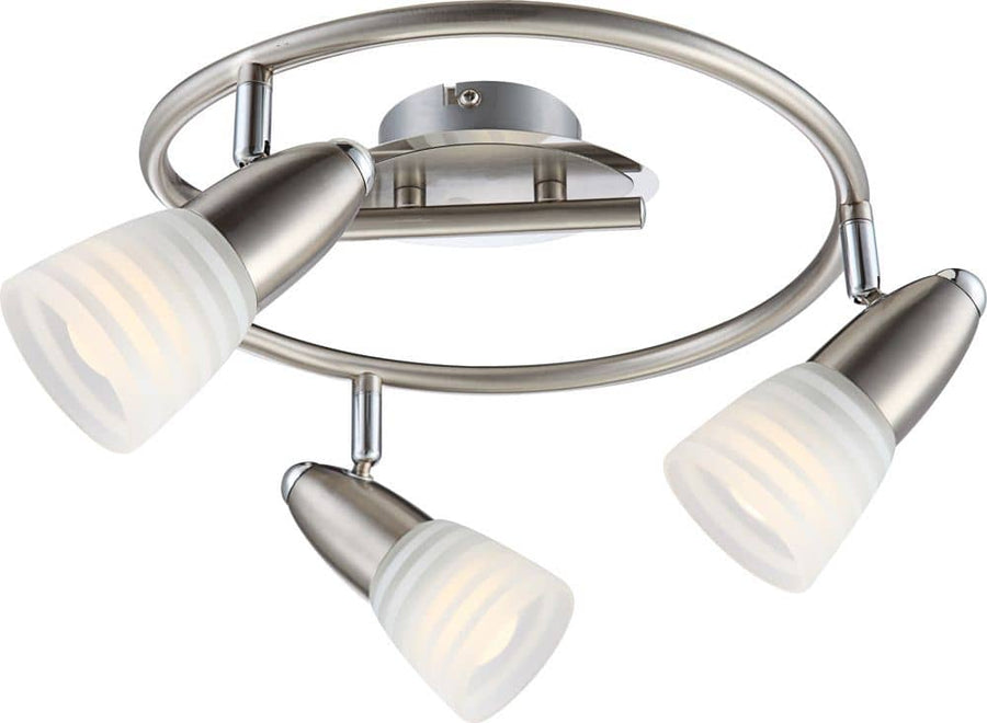Vue rapprochée du luminaire, montrant les diffuseurs en verre strié et la finition nickel