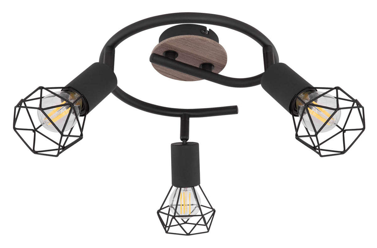 Luminaire présenté de biais, montrant les trois spots orientables allumés