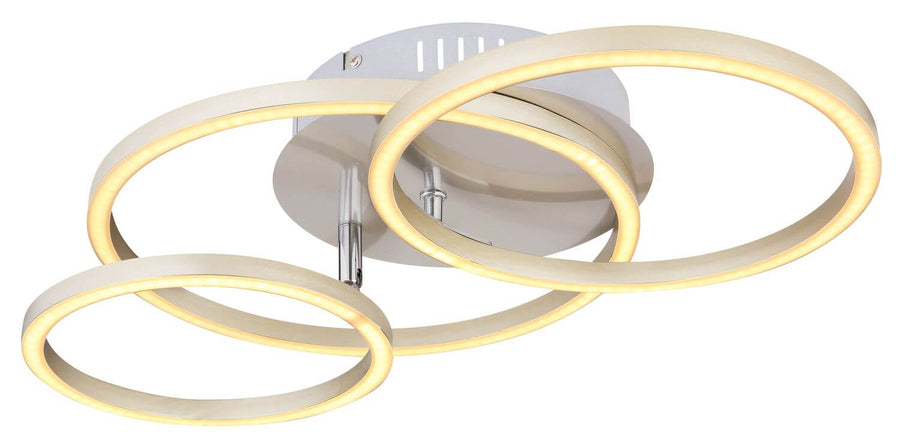 Vue rapprochée du luminaire allumé, montrant les trois cercles imbriqués