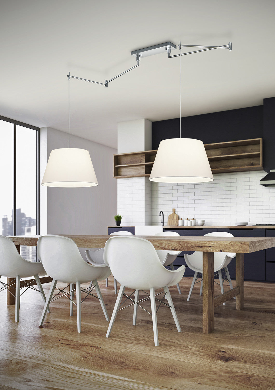 Mise en ambiance de la suspension au-dessus d'une table de cuisine moderne avec chaises blanches.