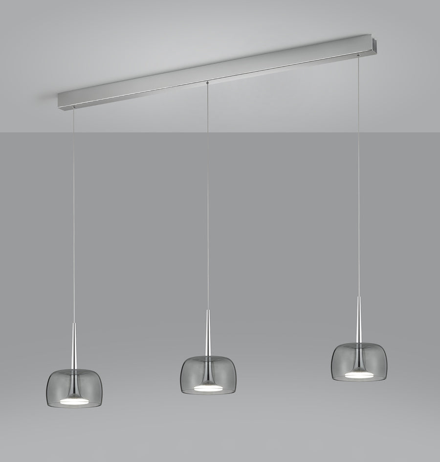 Détail des cloches en verre fumé gris et de leur finition chromée polie