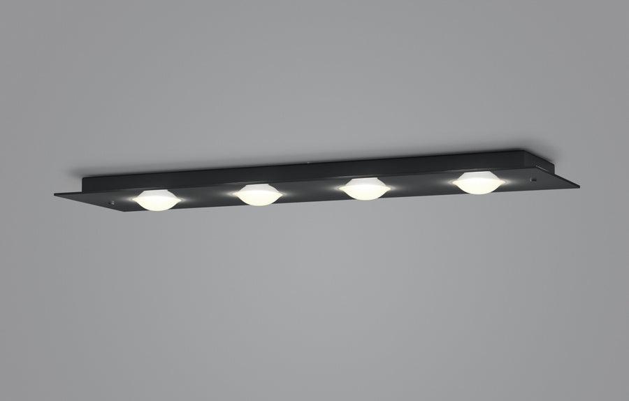 Vue de profil montrant la finesse de la platine noire et les quatre modules lumineux