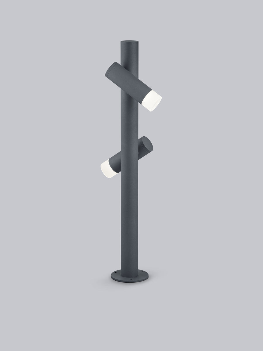 Vue arrière du lampadaire montrant l'orientation opposée des deux projecteurs cylindriques