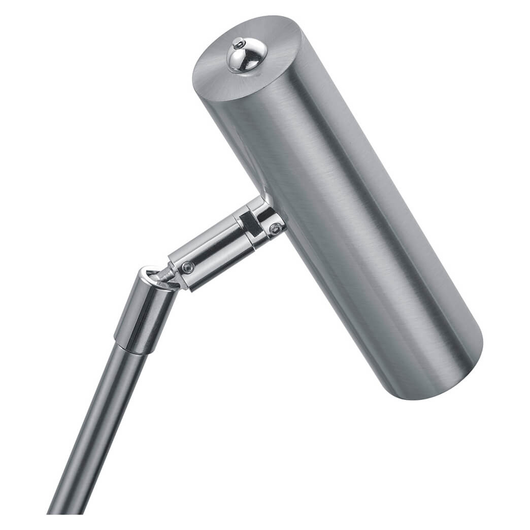 Détail de l’articulation et de la tête cylindrique, montrant la finition nickel satiné.