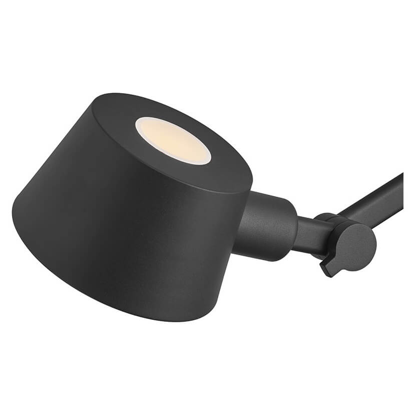 Tête d'éclairage cylindrique noire avec diffuseur lumineux blanc et orientation réglable.