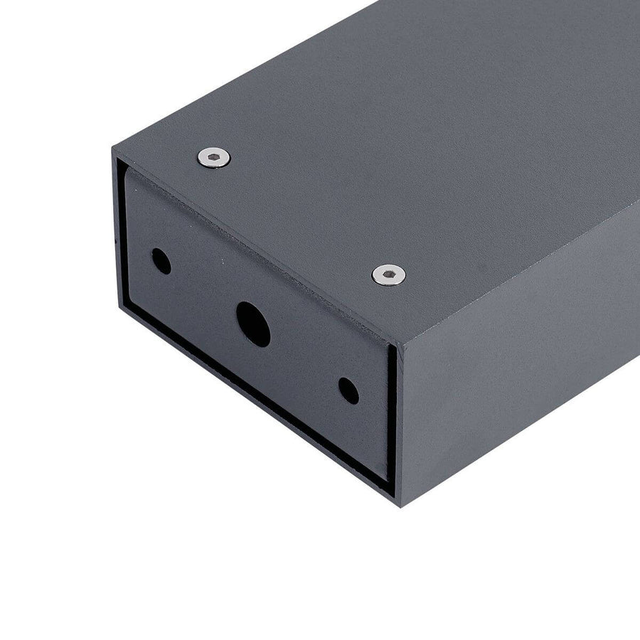Détail du luminaire anthracite avec vis, trous et finition mate texturée