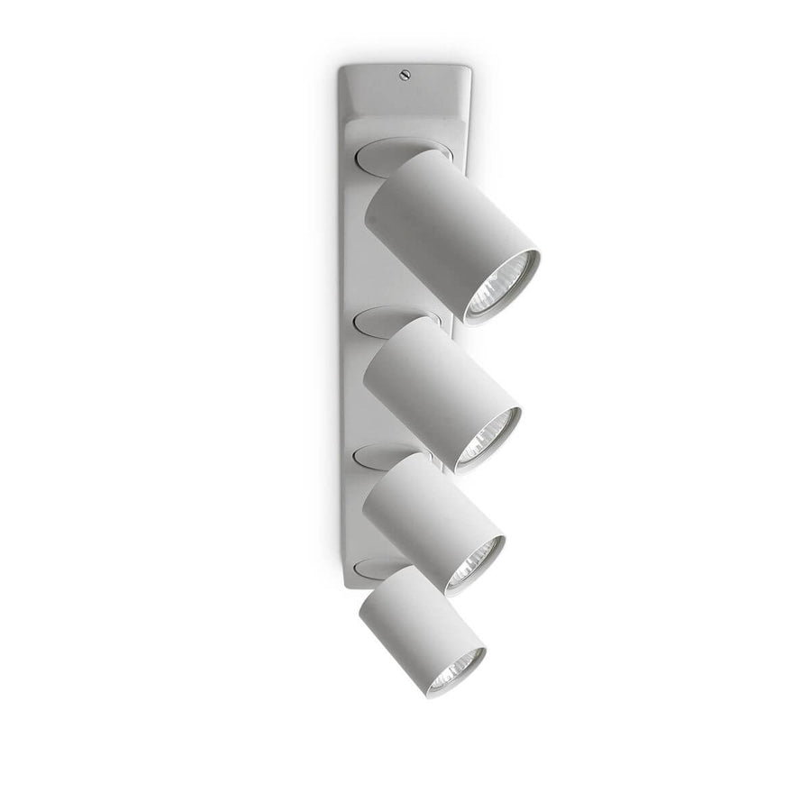 Vue de côté du luminaire blanc, spots cylindriques inclinés montrant leur orientation réglable.