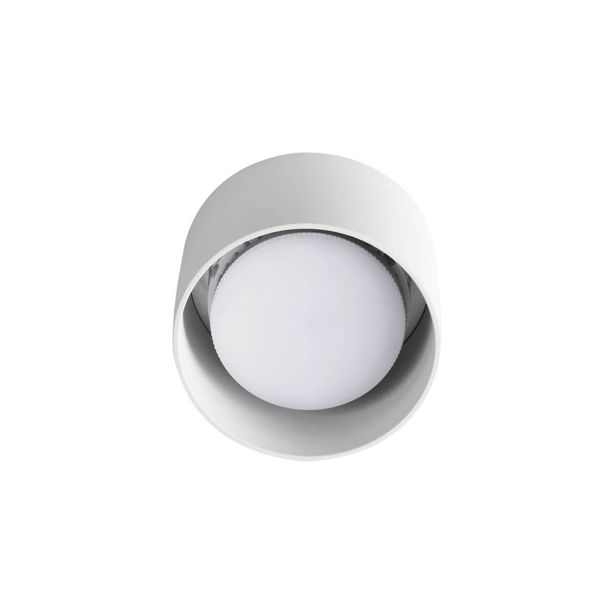 Vue de dessous dévoilant le diffuseur opale bombé et l'intérieur blanc