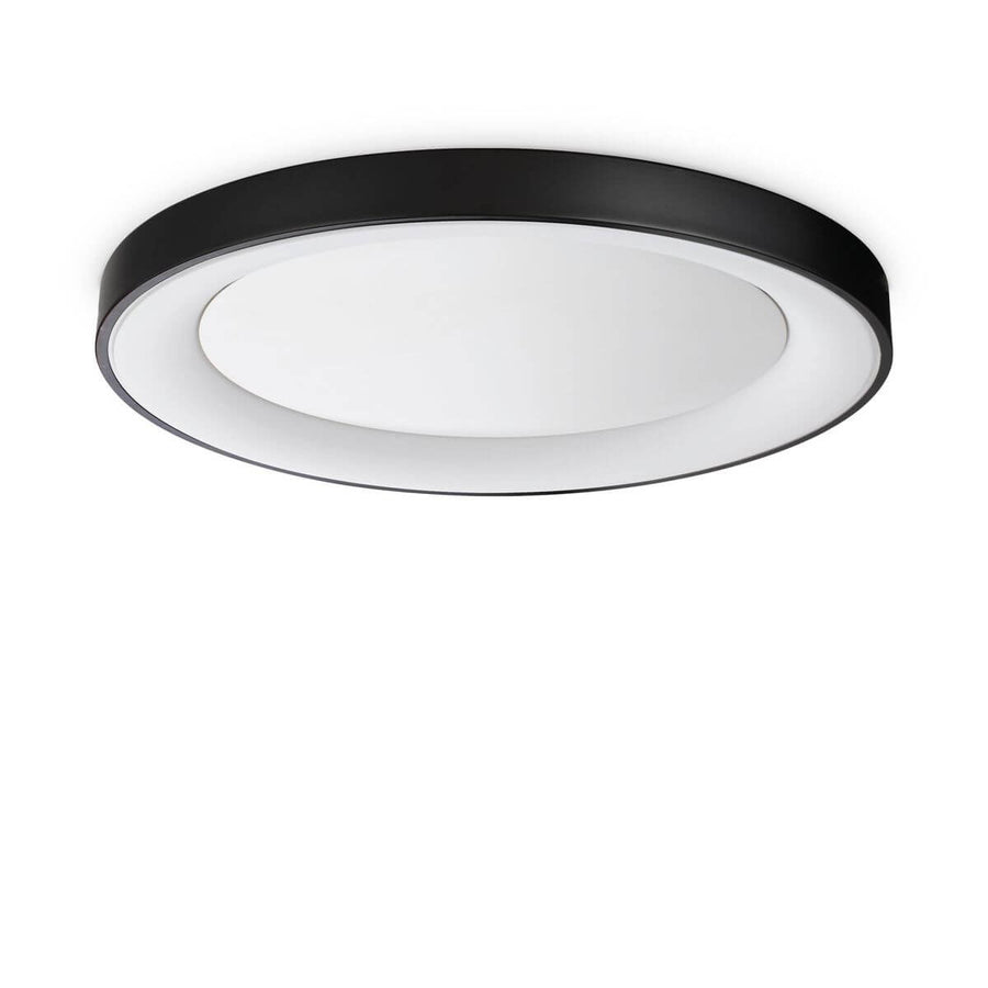 Vue de face du luminaire rond à cerclage noir et diffuseur blanc opale