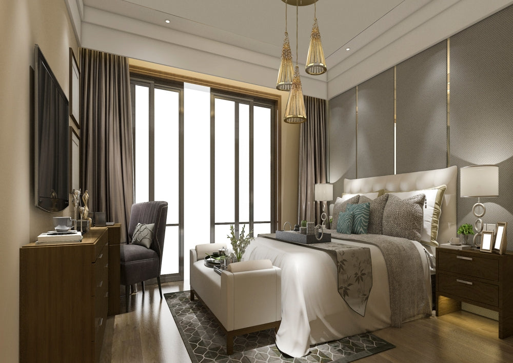 Mise en ambiance chambre, suspension suspendue près du lit, décor gris et doré élégant
