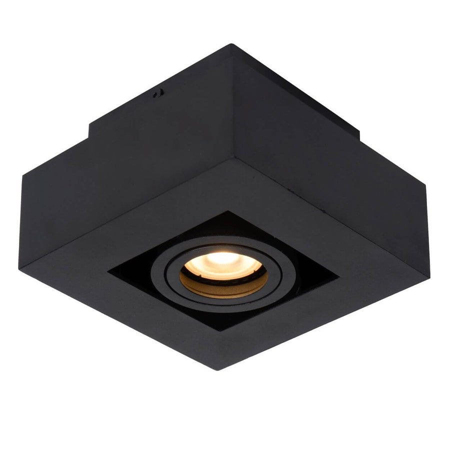 Vue en perspective du boîtier cubique noir avec spot lumineux orientable
