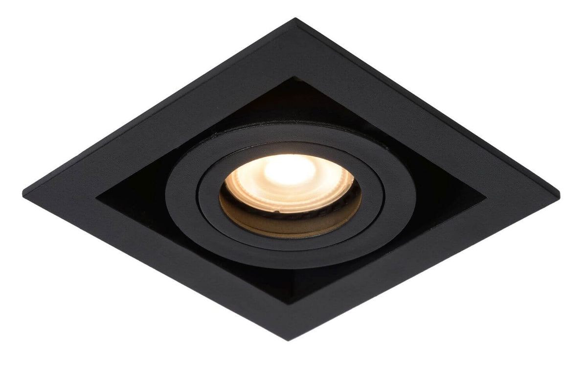 Vue de face du spot carré noir allumé, anneau intérieur et verre lumineux