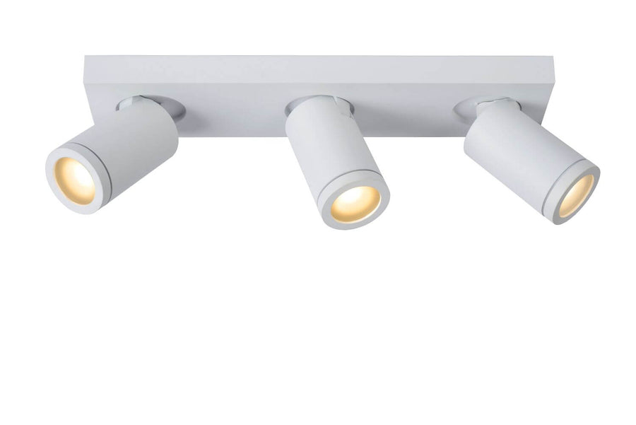 Produit de face sur fond blanc, trois spots cylindriques allumés sous une platine rectangulaire
