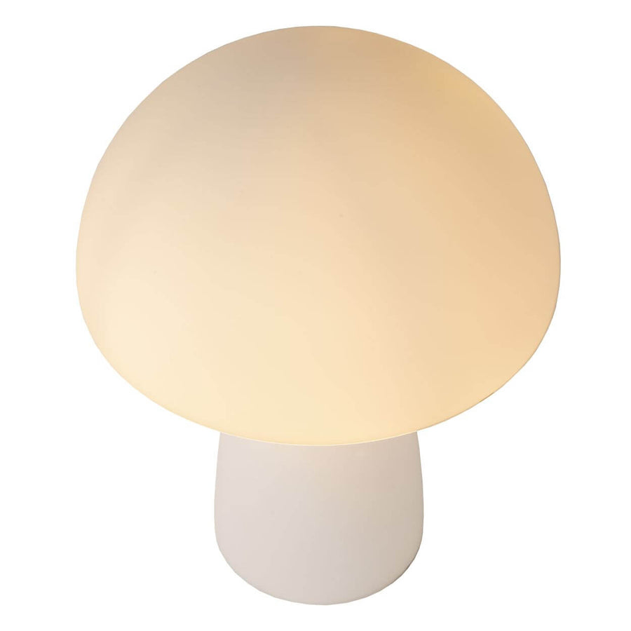 Produit de face sur fond blanc, lampe allumée, abat-jour bombé et base blanche.