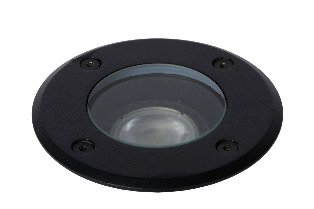 Gros plan sur la vitre de protection et réflecteur, encastré rond noir éteint