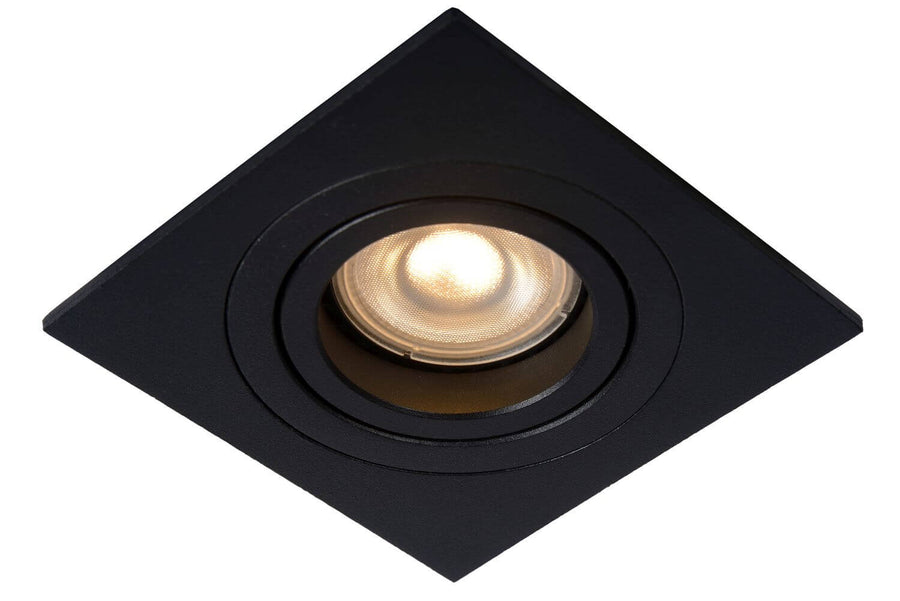 Vue de face du spot carré noir orientable, ampoule allumée